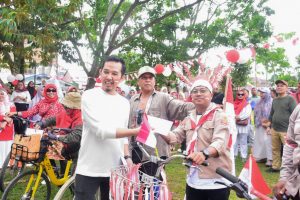 HUT RI KE-78, Diskominfo & DLH Kampar Meriahkan Sepeda Santai dan Lomba Permainan Rakyat.