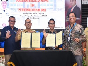 Untuk UMKM Maju dan Pemasaran Luas, PJ Bupati Kampar Apresiasi MoU Kerjasama dengan Indomaret PT. Indo Marco Prisma Tama.