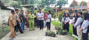 Generasi Muda Beraksi: Mahasiswa KKN UNRI  Bagikan Bibit dan Tanam Pohon di Desa Bathin Sobanga