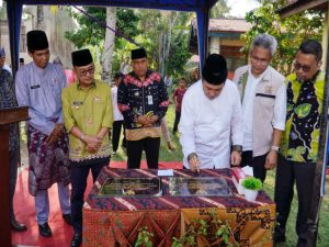 Pj Bupati Mhd Firdaus Dampingi Kunker Gubri Resmikan Jalan dan Serahkan Bankeu Khusus di Koto Kampar Hulu