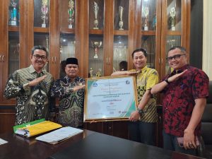 Dinas Pendidikan Kepemudaan dan Olahraga Kabupaten Kampar Berhasil Meraih Piagam Penghargaan Implementasi Kebijakan Merdeka Belajar Kategori Madya