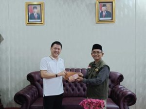 Penjabat Bupati Hambali Serahkan Zakat Maal Ke Baznas Kabupaten Kampar.