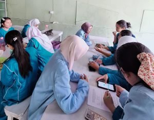 Mengatasi Krisis Literasi Teknologi Peserta Didik, Mahasiswa PKM-RSH UNRI Melakukan Uji Coba Produk Mobile Learning di SMAN 3 Pekanbaru