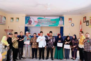 Bantuan BLT DD, Pj Sekda Kampar Komitmen Dorong Ekonomi Lokal Meningkatkan Kesra Masyarakat.