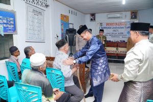 BLT DD Desa Lereng, Pj Sekda Kampar: Alhamdulilah, Semakin Sedikit Penerima BLT Semakin Meningkat Pertumbuhan Ekonomi Masyarakat.