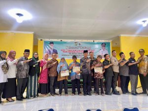 Pj Sekda Kampar Hadiri Sekaligus MemBerikan LangsungPenyaluran Bantuan Langsung Tunai (BLT) Dana Desa (DD) Triwulan III Tahun 2024