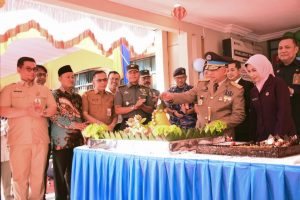 PJ Bupati Kampar Menghadiri Upacara Sekaligus Penyerahan Sertifikat Tanah Dalam Rangka HANTARU Ke 64 Tahun 2024