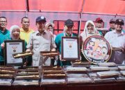 Hari Jadi Kampar Ke-75 Pemda Kampar Pecahkan Rekor Muri 1. 373 Sajian Gulai Ikan Salai Patin