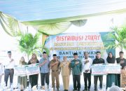 Wabup Kampar Distribusikan Zakat Bantuan Pendidikan Kepada 1.153 Orang Mahasiswa dari Baznas Kampar