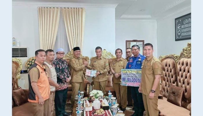 Pemkab Kampar Salurkan Donasi Tunai untuk Korban Bencana di Kabupaten 50 Kota