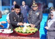 Sinergitas Tanpa Batas, Bupati Kampar Hadiri Upacara Peringatan Hari Bhayangkara Ke-80.